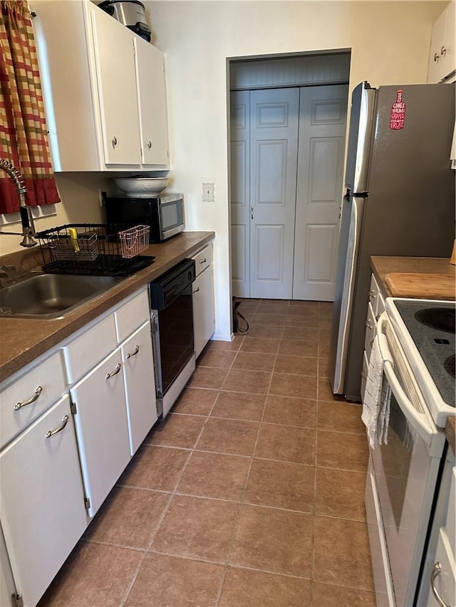 laundry area featuring tile walls