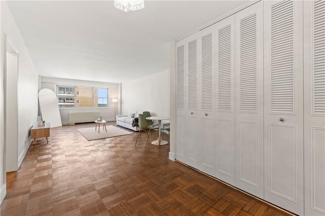 interior space with dark parquet flooring