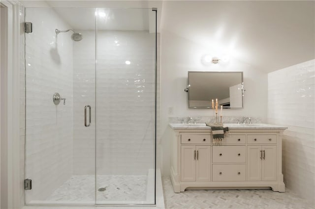 bathroom with vanity and an enclosed shower