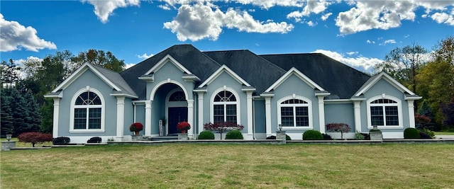 view of front of house with a front lawn