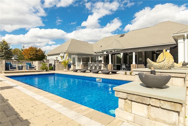 view of pool with an outdoor hangout area and a patio area