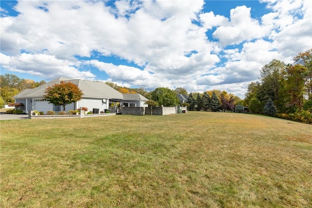 view of yard featuring a garage