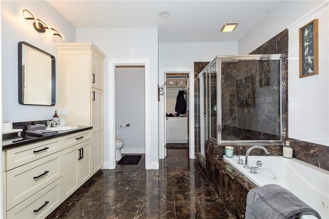 full bathroom with plus walk in shower, vanity, and toilet