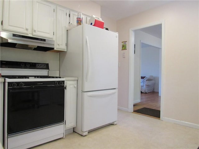 kitchen featuring white cabinets, white appliances, and light hardwood / wood-style flooring