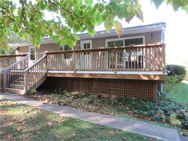 rear view of property with a deck