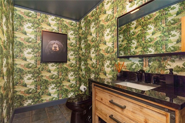 bathroom with vanity and toilet