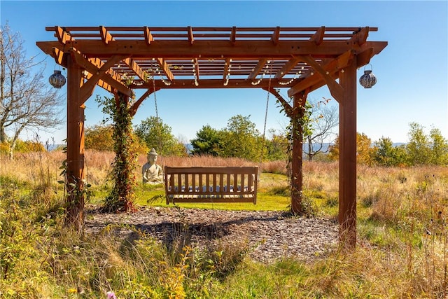 view of property's community with a pergola