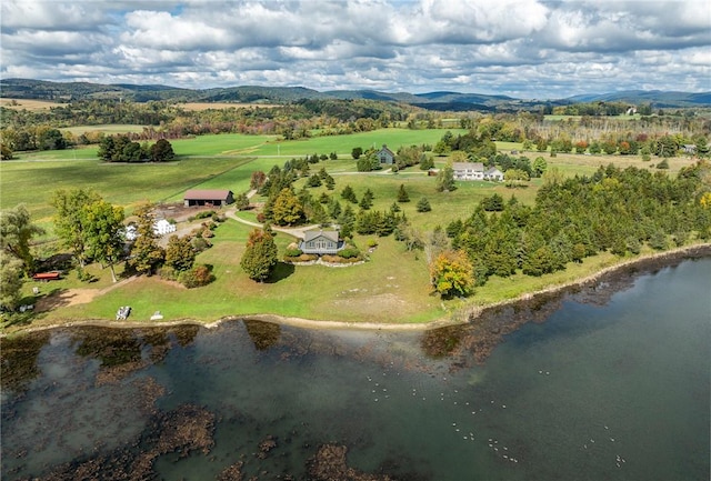 birds eye view of property with a rural view and a water and mountain view