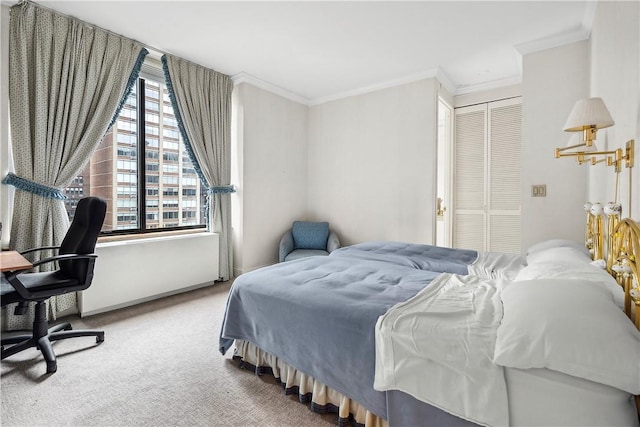 bedroom featuring carpet flooring, a closet, and ornamental molding