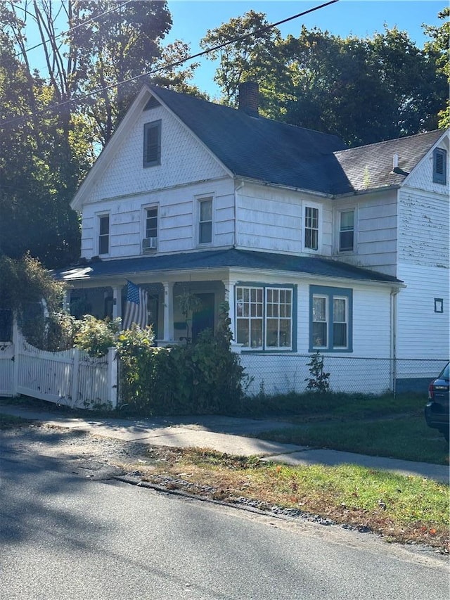 71 High St, Monticello, NY 12701 - view of front of home with a chimney