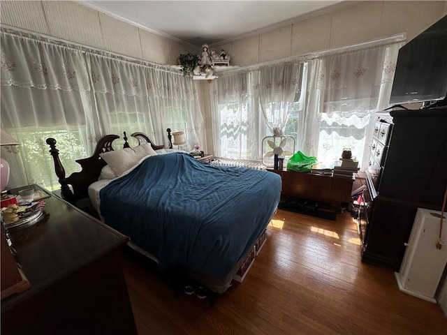 bedroom featuring hardwood / wood-style flooring