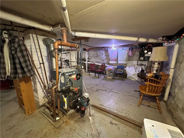 71 High St, Monticello, NY 12701 - unfinished basement with a heating unit