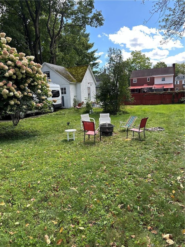 71 High St, Monticello, NY 12701 - view of grassy yard with a fire pit