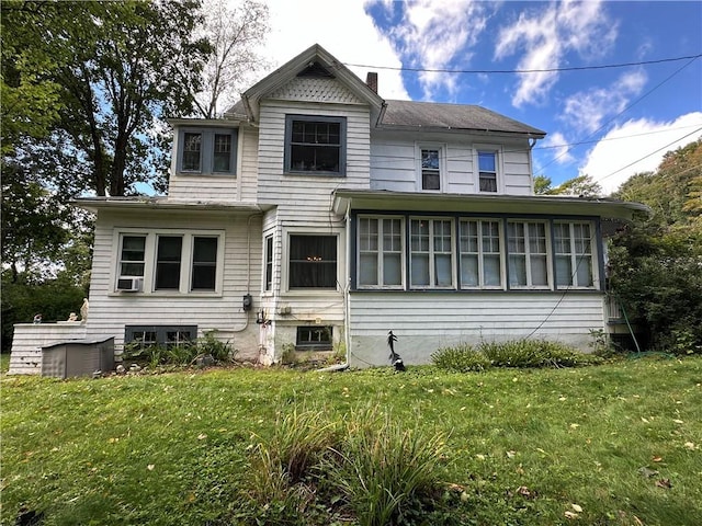 71 High St, Monticello, NY 12701 - view of front of home featuring a front lawn, a sunroom, and a chimney