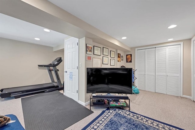 workout room featuring carpet floors