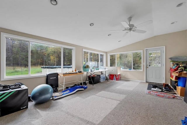 sunroom featuring ceiling fan and vaulted ceiling