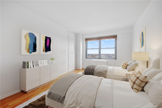 bedroom featuring light hardwood / wood-style floors