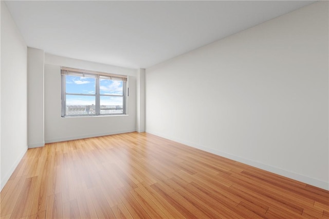 empty room featuring light hardwood / wood-style floors