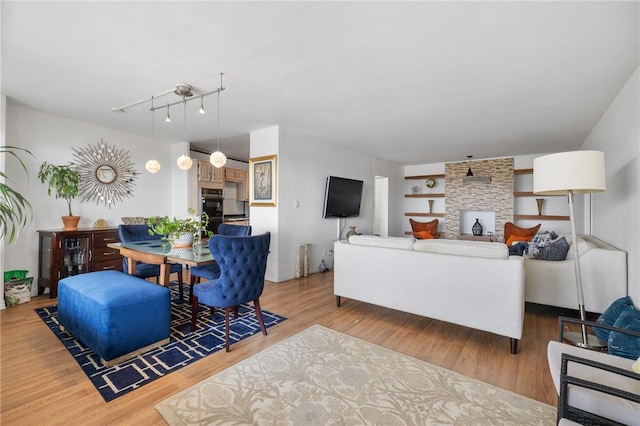 living room with light hardwood / wood-style floors