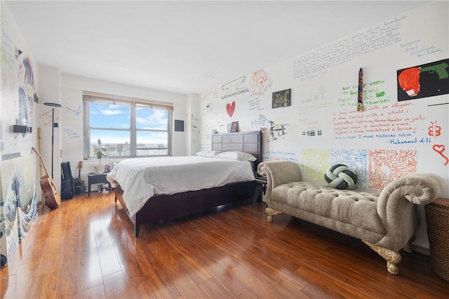 bedroom featuring hardwood / wood-style floors