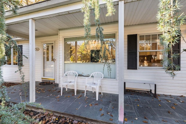 entrance to property with a porch