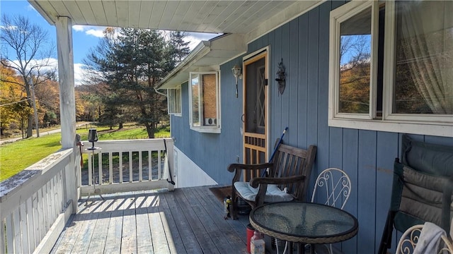 wooden deck featuring a porch