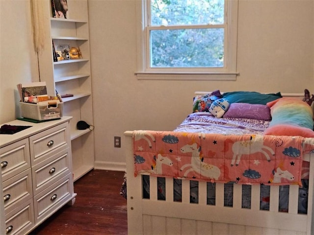 bedroom featuring dark hardwood / wood-style floors