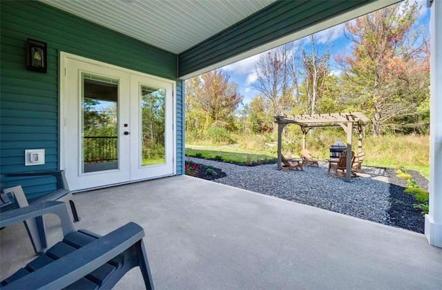 view of patio / terrace featuring a pergola and french doors