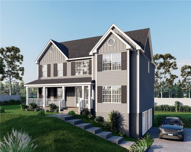 view of front facade featuring covered porch, a front yard, and a garage