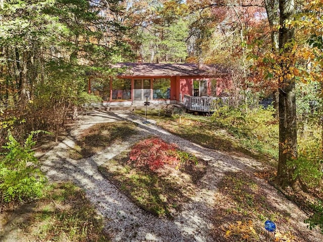 view of yard featuring a wooden deck