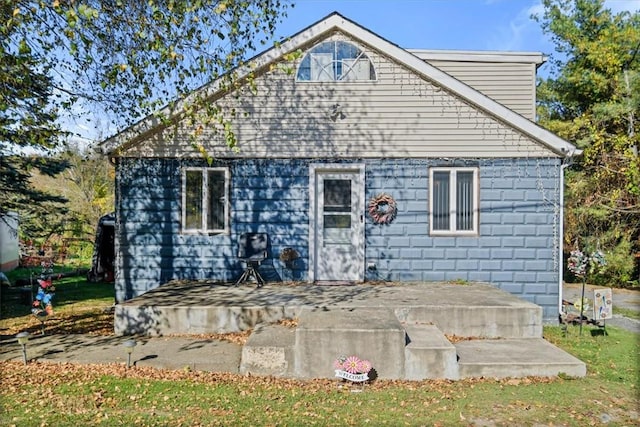 rear view of property with a patio