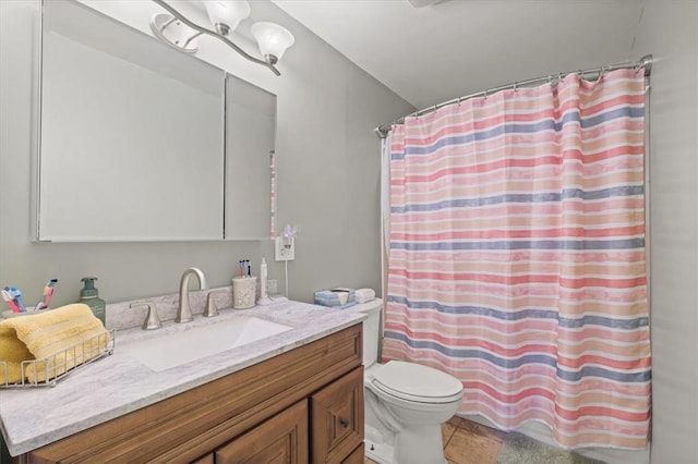 bathroom featuring tile patterned flooring, vanity, toilet, and a shower with curtain