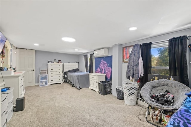 carpeted bedroom featuring a wall mounted air conditioner