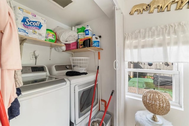 washroom featuring washing machine and dryer