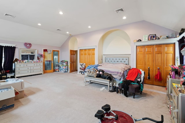 carpeted bedroom with lofted ceiling, visible vents, and recessed lighting