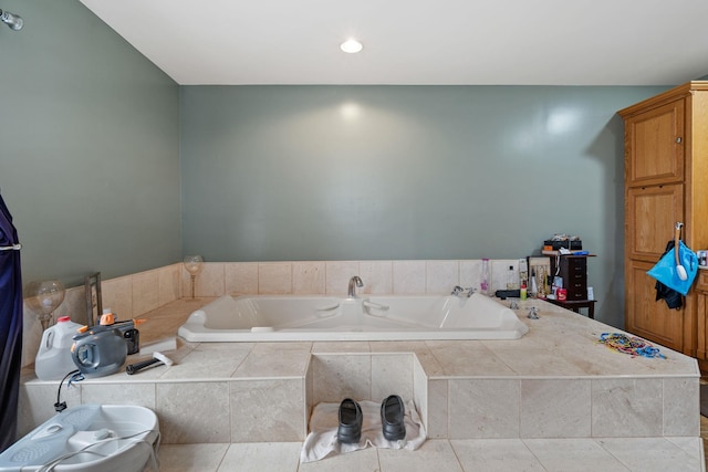 full bath with a garden tub and recessed lighting