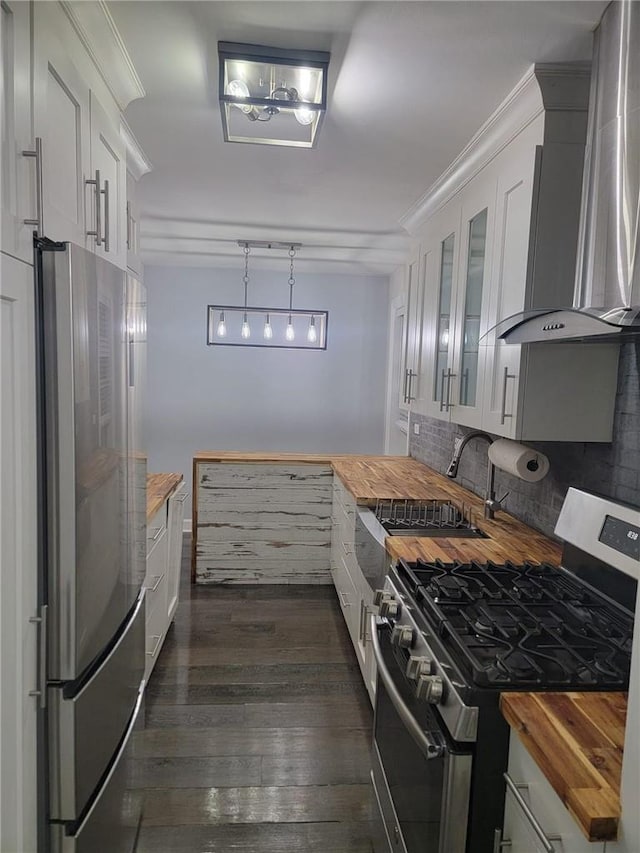 245BRONXRIVERRD Bronx River Rd Unit 3E, Yonkers, NY 10704 - kitchen featuring butcher block counters, stainless steel appliances, wall chimney range hood, decorative backsplash, and white cabinets