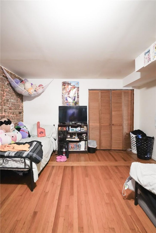 bedroom featuring wood-type flooring