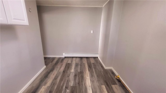 interior space featuring dark hardwood / wood-style floors and a baseboard radiator