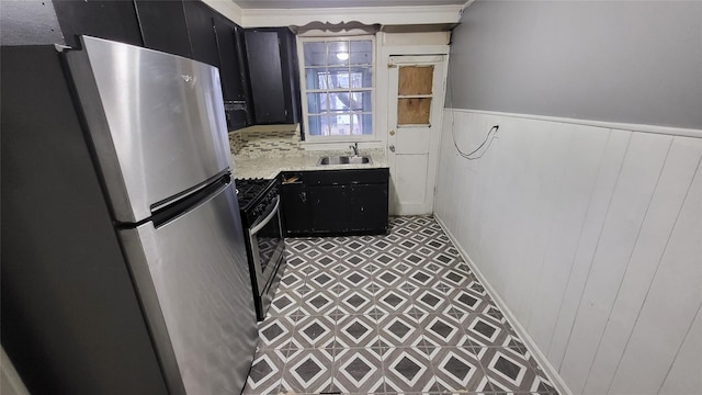 kitchen with sink and appliances with stainless steel finishes