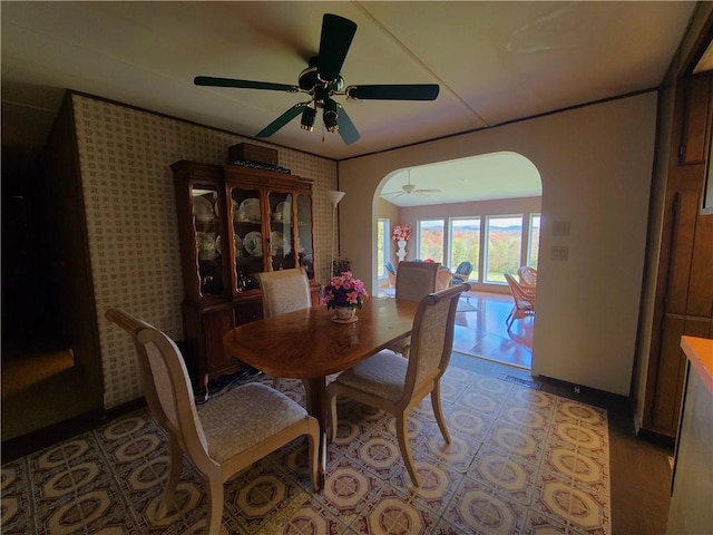 dining space with ceiling fan