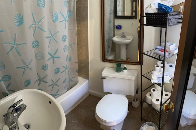 full bathroom featuring tile patterned floors, shower / bath combo, toilet, and sink