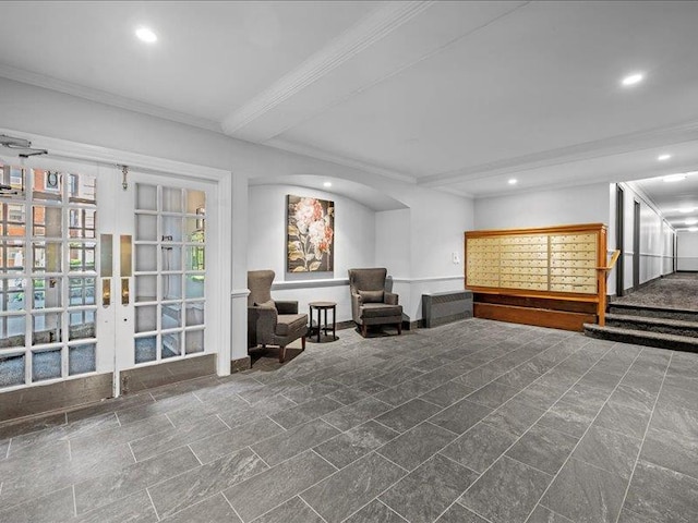 unfurnished bedroom with beamed ceiling, french doors, and crown molding