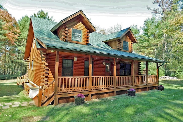 view of front of home featuring a front yard and a porch