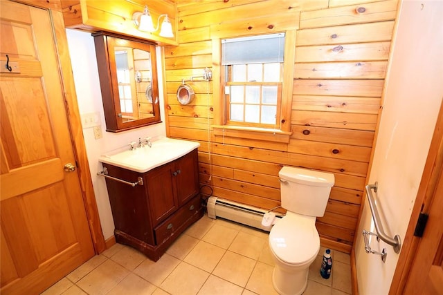 bathroom featuring a baseboard radiator, tile patterned flooring, toilet, wooden walls, and vanity