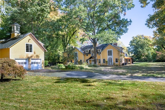 view of yard with a garage