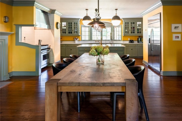 dining space featuring dark hardwood / wood-style floors