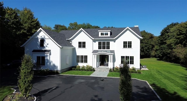 view of front of home with a front yard