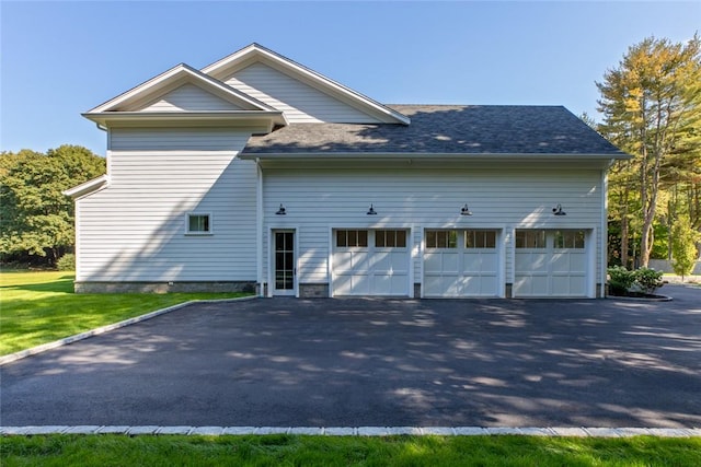 view of home's exterior with a garage