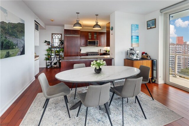 640 W 237th St Unit 12B, Bronx, NY 10463 - dining space with dark wood-type flooring